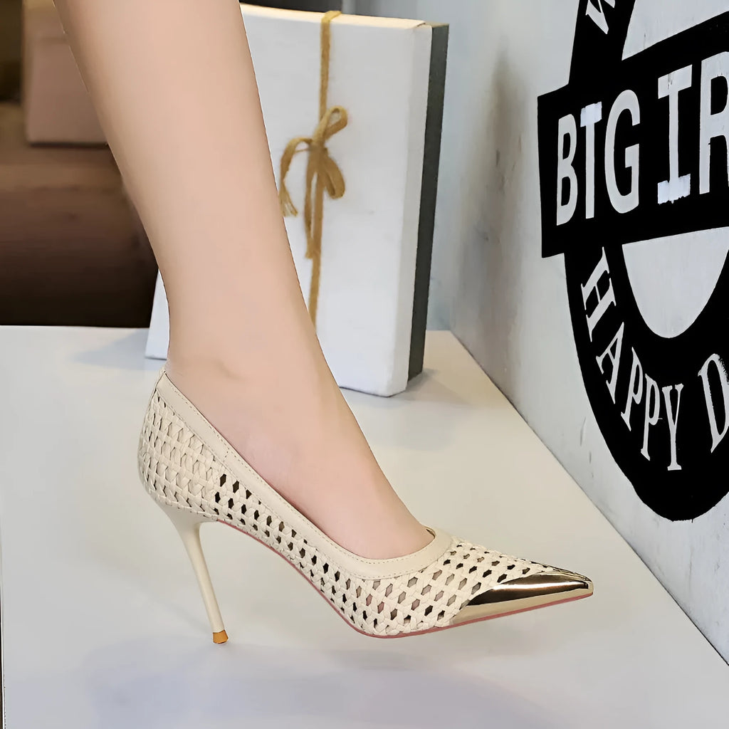 Women's stiletto heel pumps with hollow-out pattern and solid colour finish in a choice of four shades