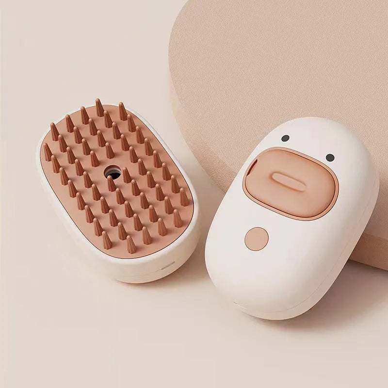 White and yellow rechargeable steam brush for grooming dogs and cats