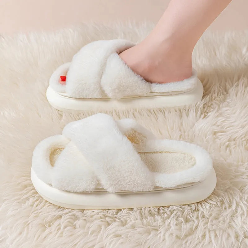 Women's platform fuzzy suede open toe criss-cross house slippers in Khaki on a wooden floor