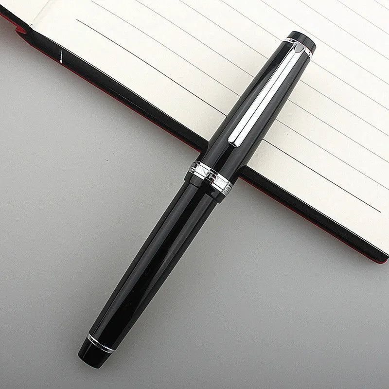 Short pocket business pen with resin body and stainless steel nib, shown with gold clip
