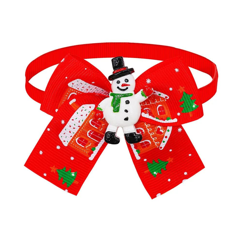 Red and green British style polyester bow tie accessory with elastic band for pet, doll or Christmas tree.