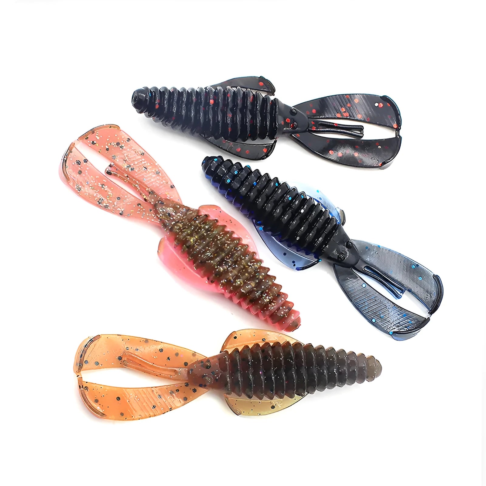 PVC soft plastic fishing lure in a worm shape, shown in a selection of different colours on a tackle box.