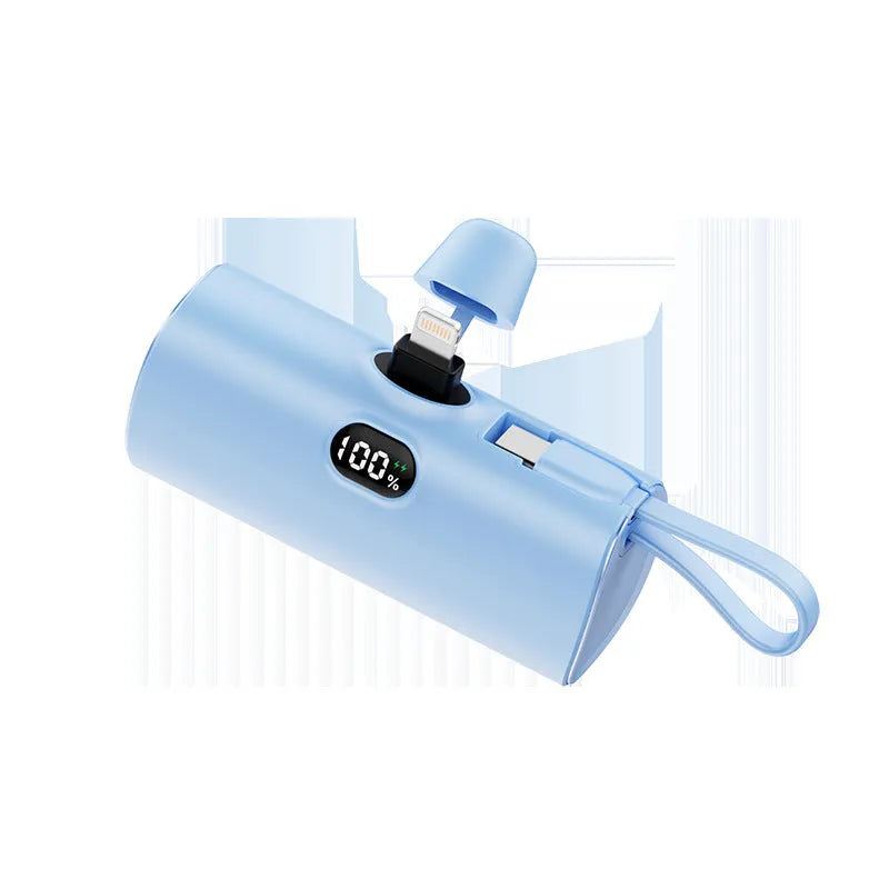 Capsule-shaped digital display power bank with folding plug in multiple colours.
