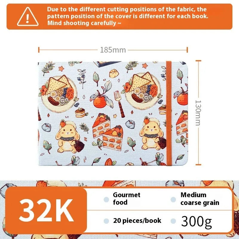 Feiluniao handmade fabric watercolour notebook with illustrated cover, open to show blank paper pages.