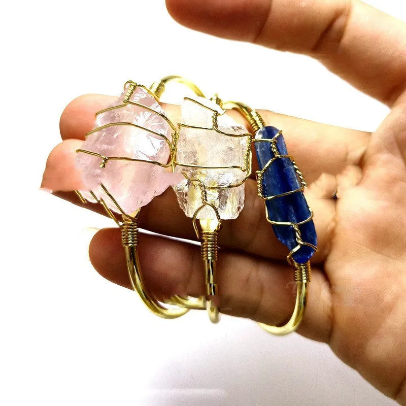 Handmade natural crystal rough stone bracelet with gold wire winding in geometric bohemian style