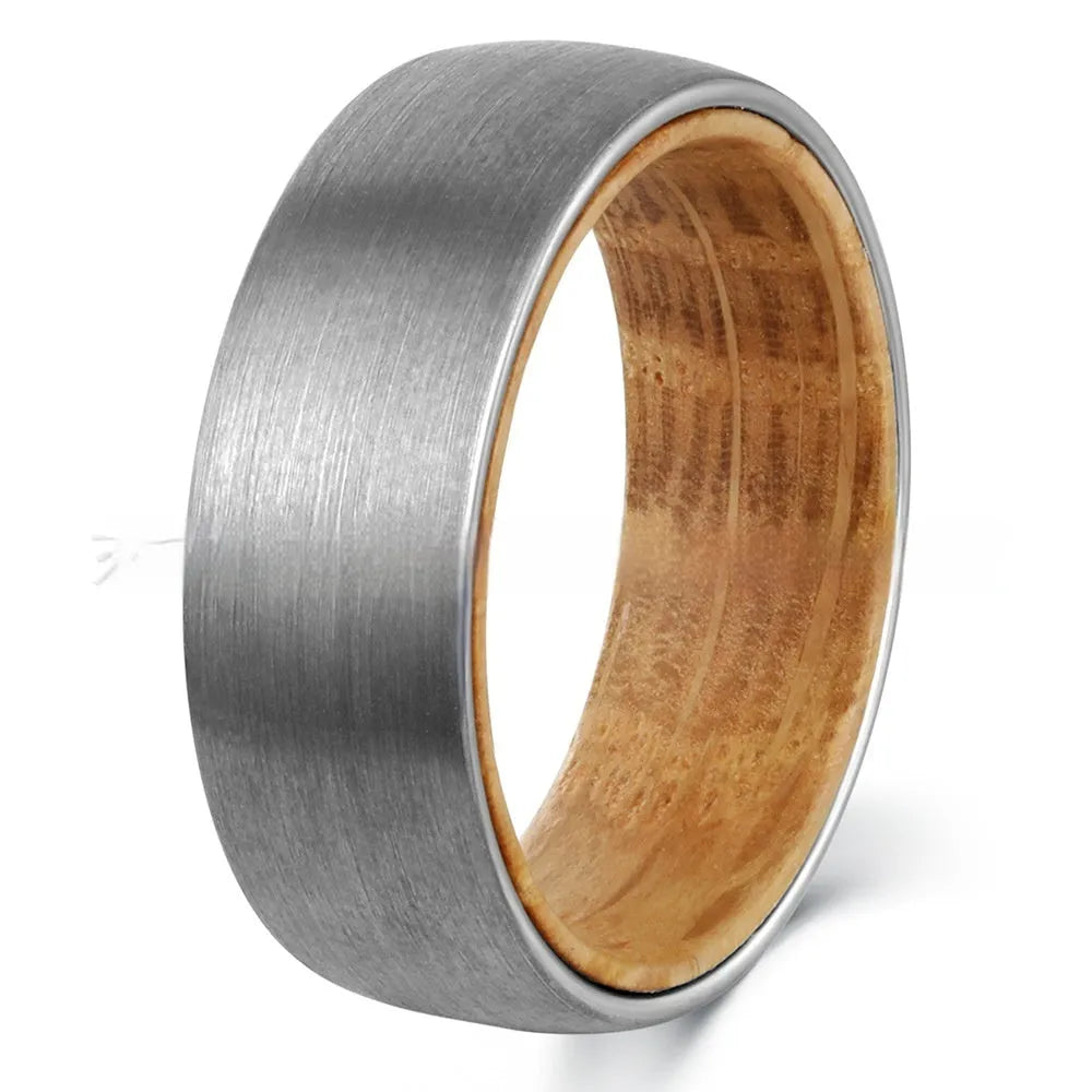 Silver tungsten ring with barrel wood inlay for men, simple band on light background