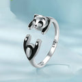 Adjustable sterling silver panda ring with white gold plating and open design