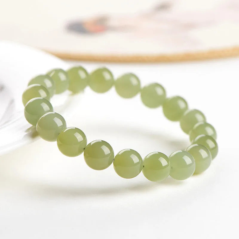 Hetian jade bracelet with polished round beads in ice-like clear colours, 4mm to 10mm sizes, unisex style