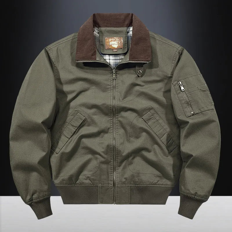 Men's plus size washed cotton baseball flight jacket in army green on a hanger.