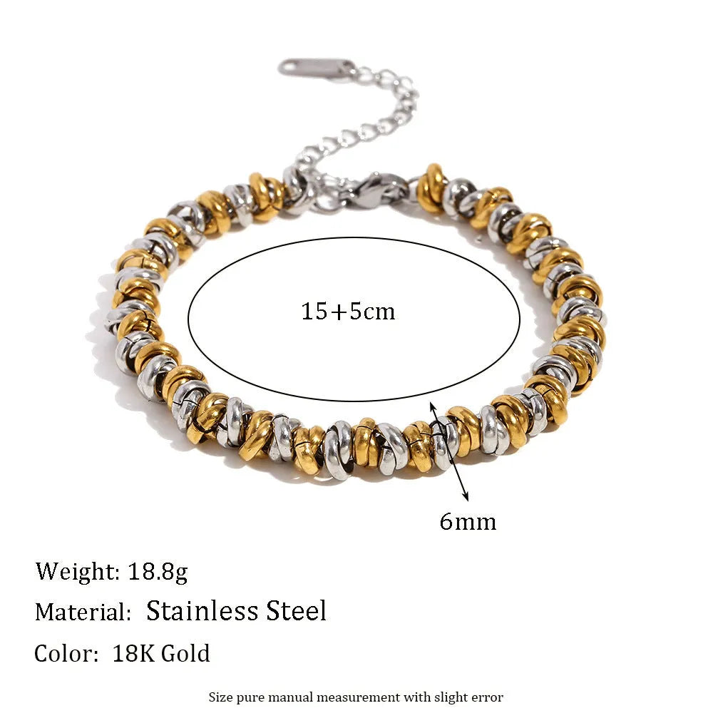 Gold geometric jewellery set with earrings, bracelet and necklace for women
