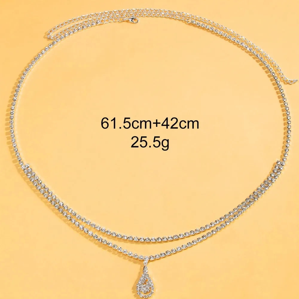 Women's rhinestone waist chain with water drop pendant showing gold and silver colour options