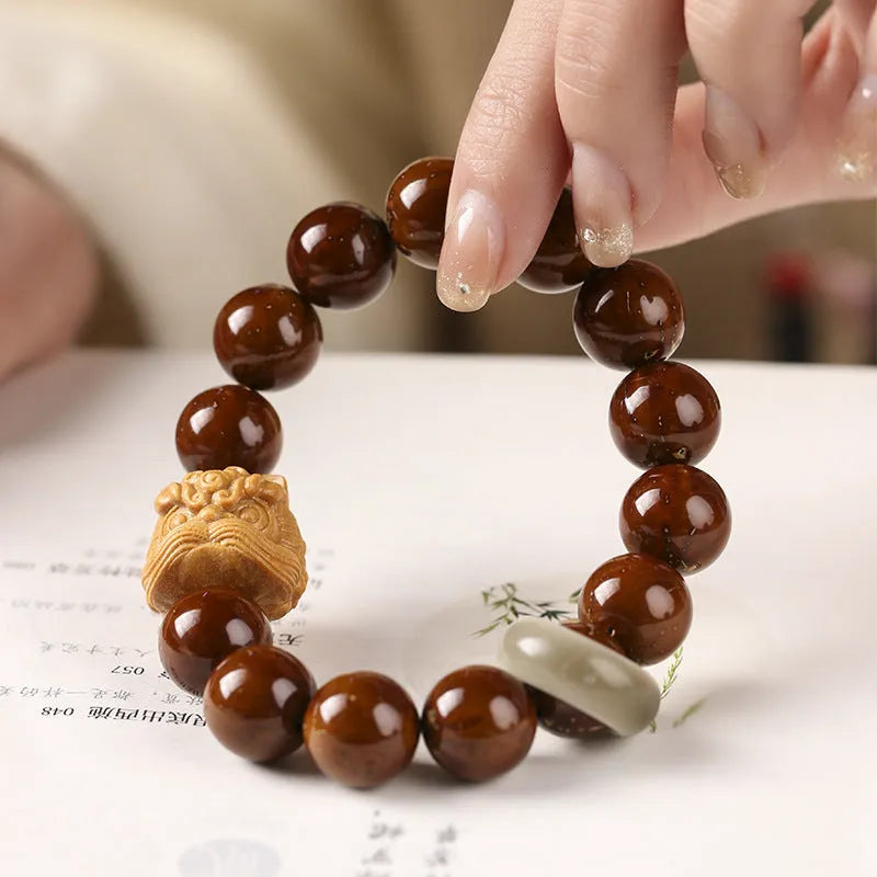Hand-woven ivory nut lion round beads bracelet with 13mm beads and retro national style design