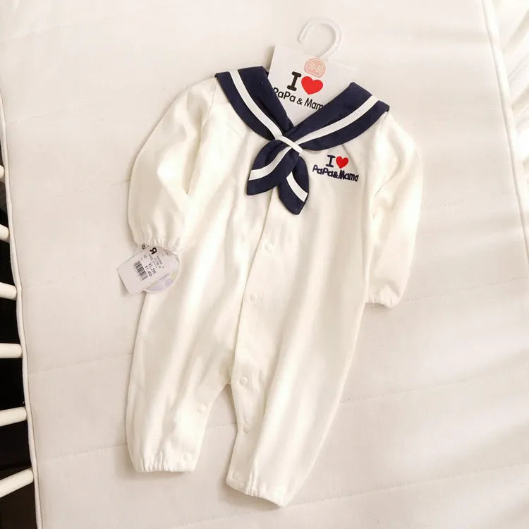Navy cotton baby onesie with long sleeves and detachable hood on white background