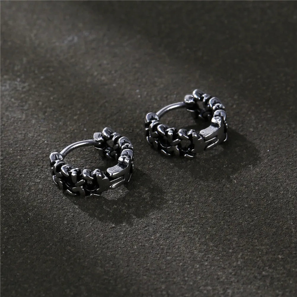 Men's polished copper geometric stud earrings in 10mm and 14mm sizes on a plain background.