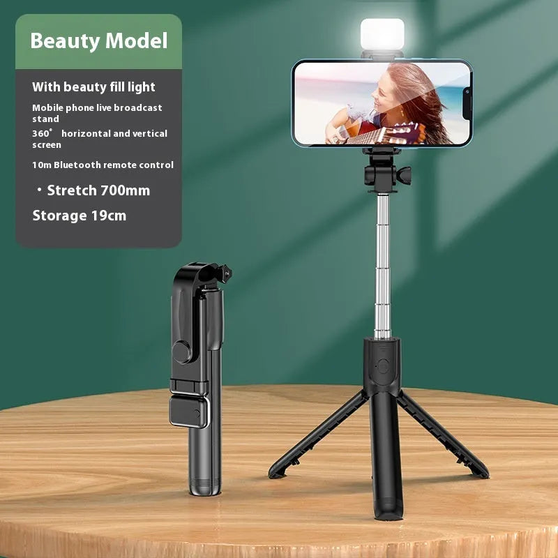Bluetooth selfie stick tripod with built-in light, 70cm extendable arm, and universal phone holder in Black