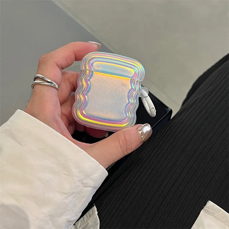Silicone case with laser engraving and a coloured ring for Apple AirPods charging case.