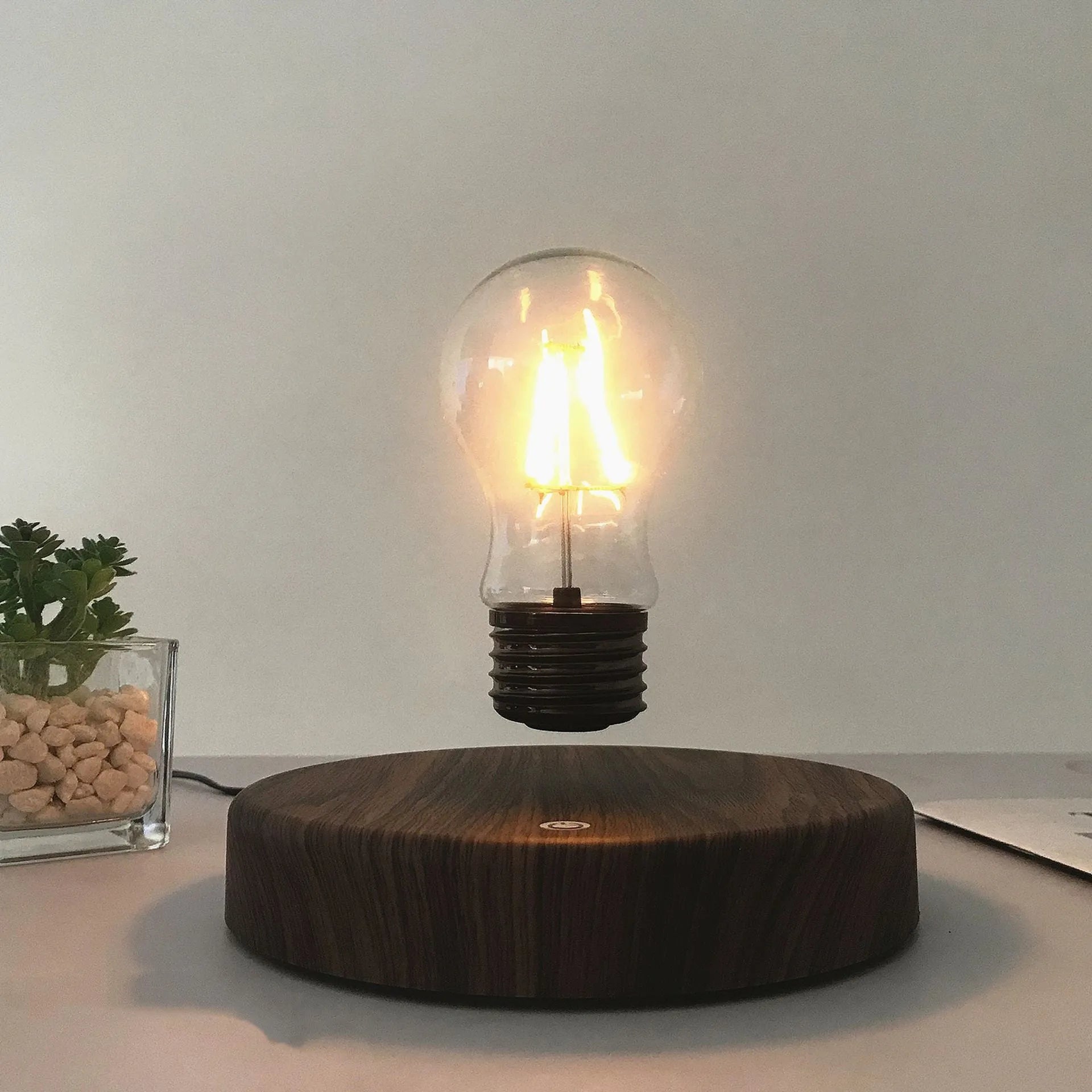 Magnetic levitation bulb night light in solid wood colour with floating bulb and plastic lamp holder