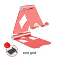 Aluminium alloy folding mobile phone desktop stand in black colour on a desk surface