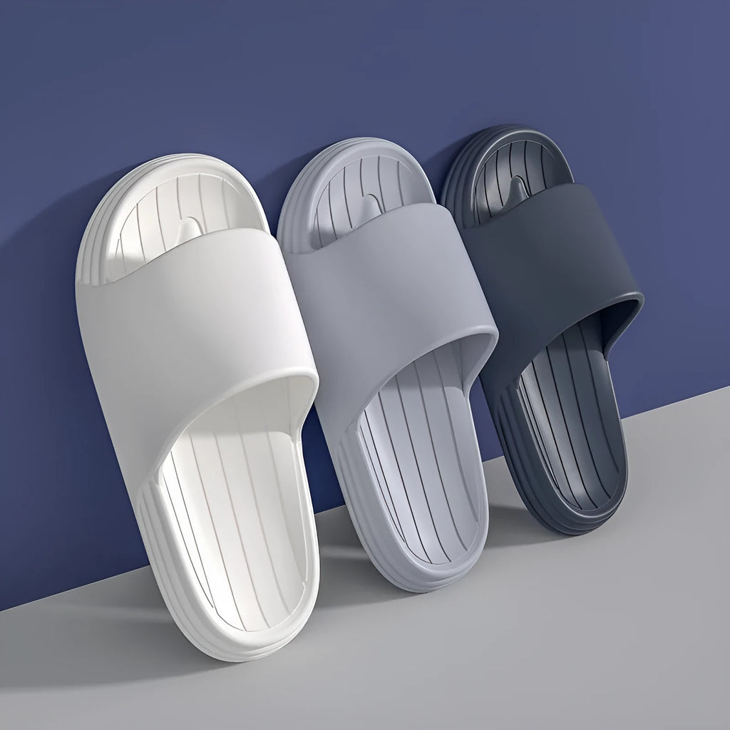 Unisex EVA injection moulded indoor slippers with floral detail, available in multiple colours
