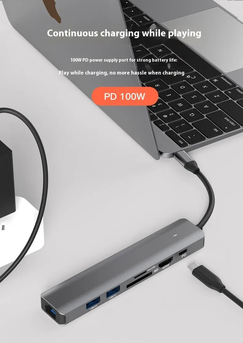 7-in-1 USB C computer hub with SD card slots and charging port for laptop connectivity expansion