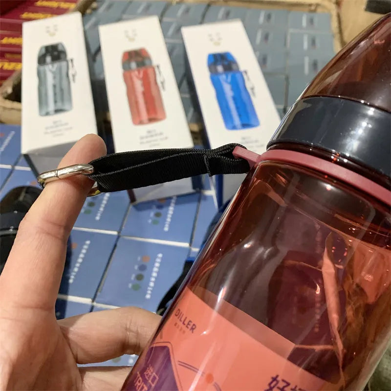 Blue portable sports water cup with a separate internal tea compartment and Chinese style design.
