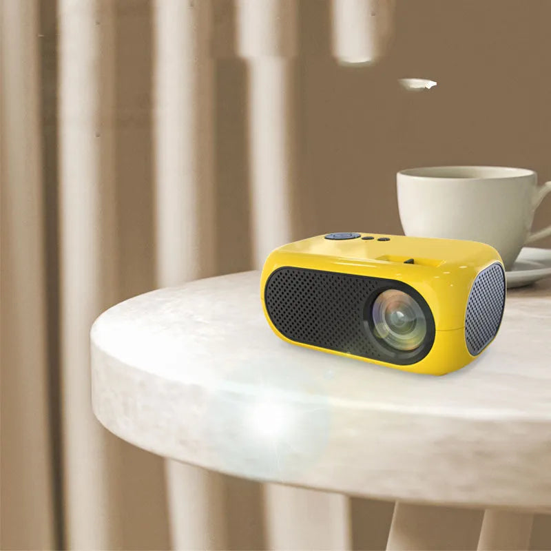M24 micro mini LED portable projector in gold finish with front lens and vents