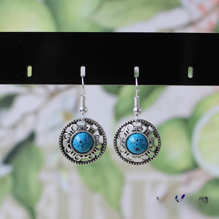 Miao silver retro turquoise flower disk earrings with geometric ethnic design in red, blue, or black colours