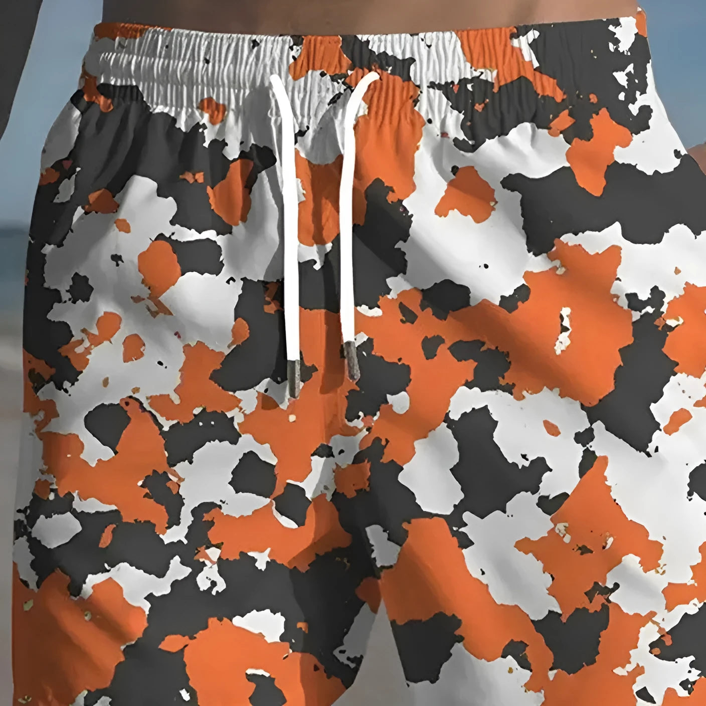 Men's solid colour beach shorts in polyester fabric with elastic waistband for travel