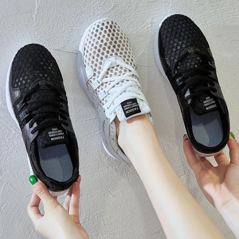 Men's breathable mesh sneakers with hollow-out design and flat EVA sole in black and white colour options