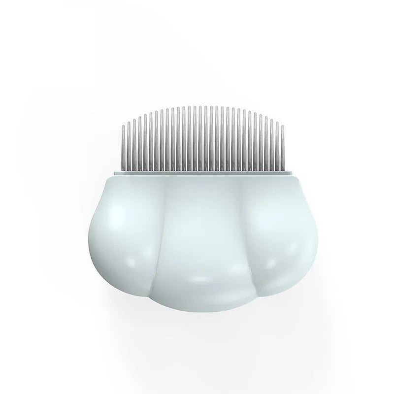 Blue Paw Soft deshedding brush for cats and dogs on a white surface.