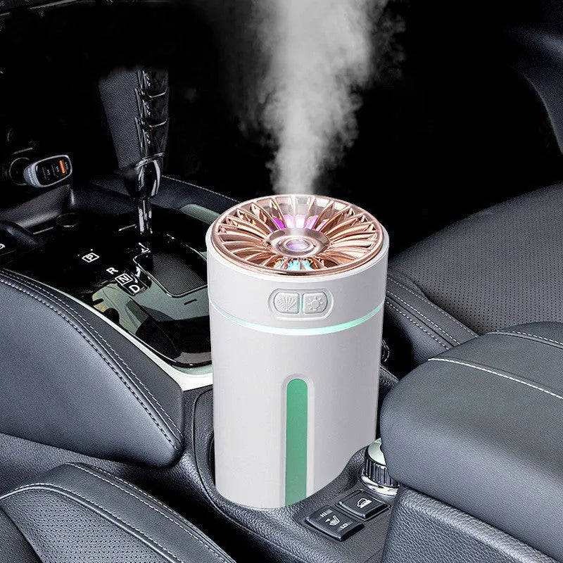 Portable black USB humidifier with colourful lights on car cup holder