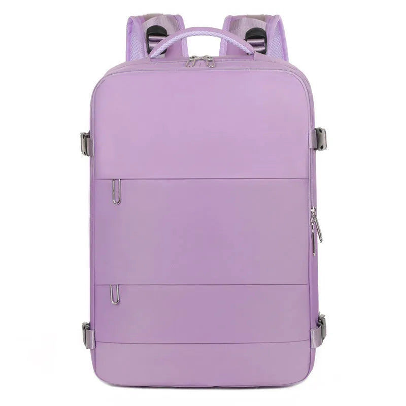 Large grey travel backpack for women with multiple compartments, shown open.