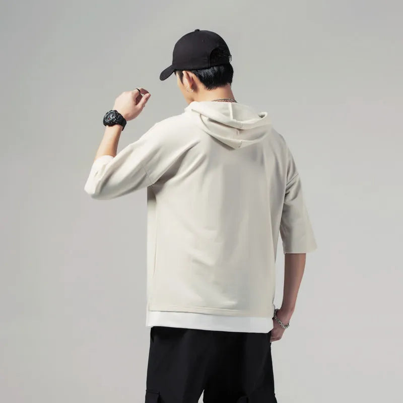 Solid colour loose fit hooded men's short-sleeved T-shirt in black with 3/4 sleeves