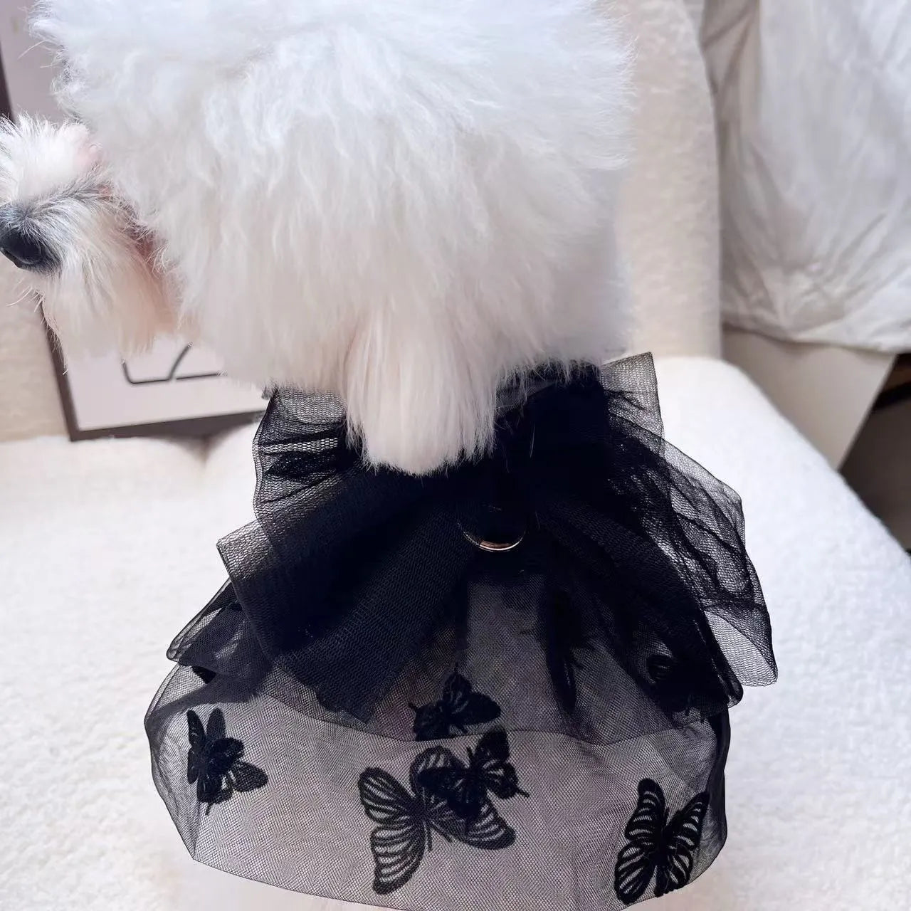 Black polyester princess tulle skirt for a small dog or cat, shown on a mannequin.