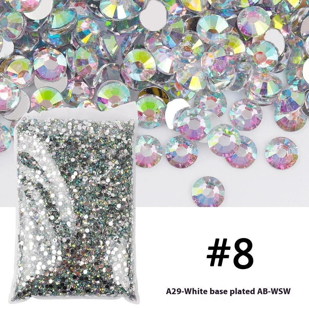 Plastic resin nail art rhinestones in multiple colours with electroplated surfaces arranged in mesh packaging