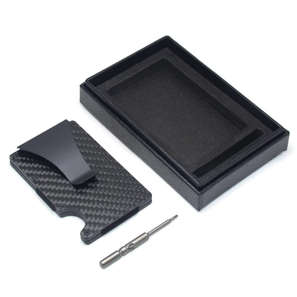 A slim carbon fibre card holder wallet in a geometric design, shown with business cards.