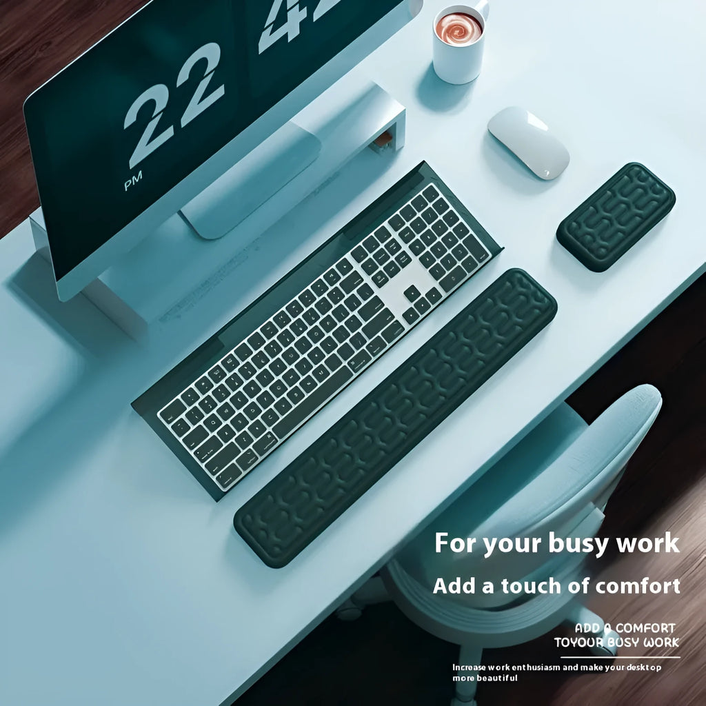 Double-sided memory foam keyboard and mouse pad with wrist support in various colours.