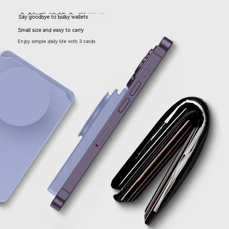 Minimalist black magnetic suction phone holder for iPhone on a desk.