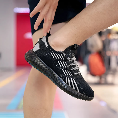 Men's white low-top platform sports shoes made from breathable flying fabric with a round toe and mesh lining.