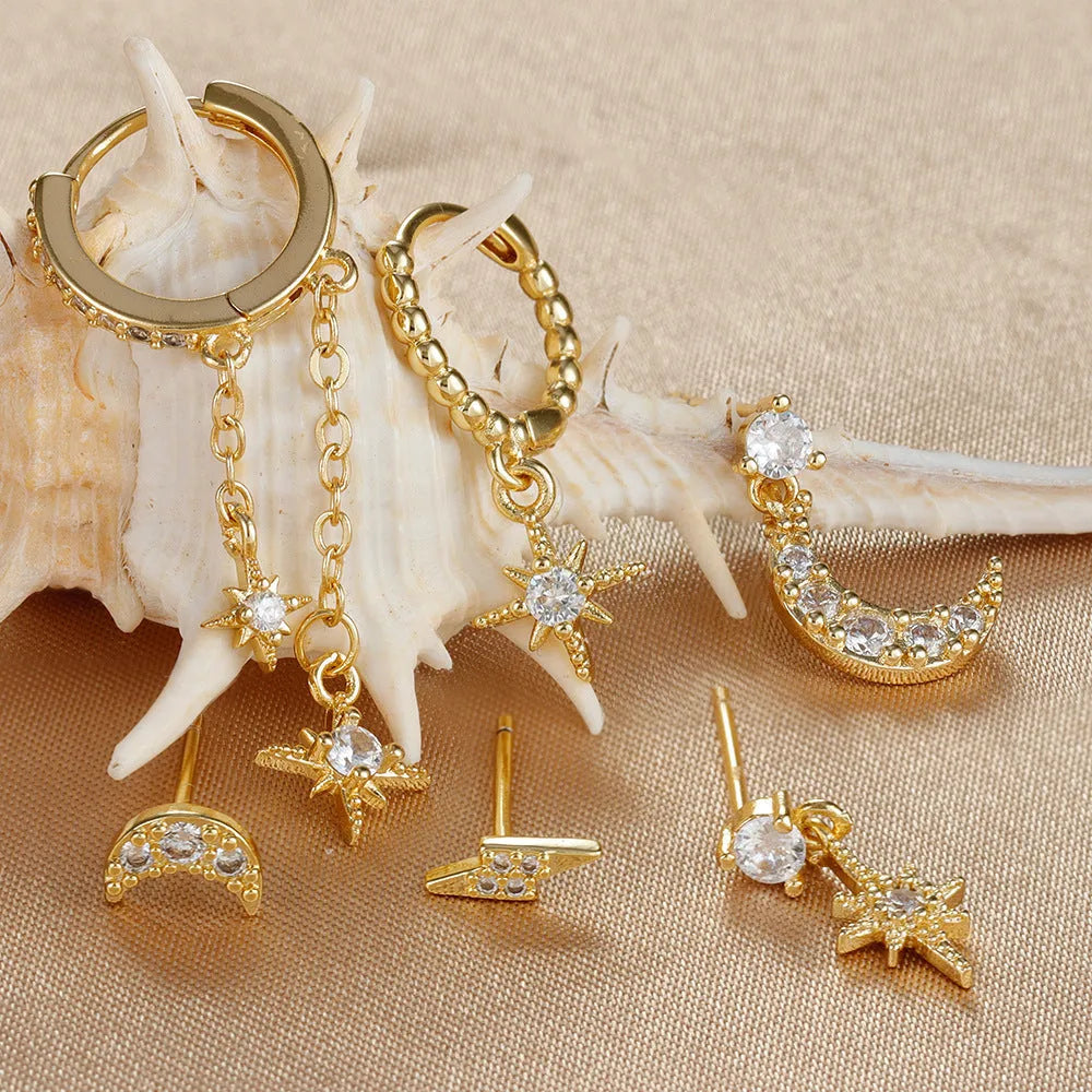 XINGX gold electroplated chain tassel earrings with zircon studs, six-piece set showing three complete pairs