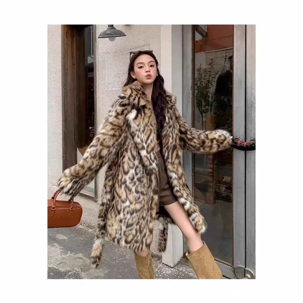 Street fashion faux fur coat with fur collar and pockets in artificial fur fabric