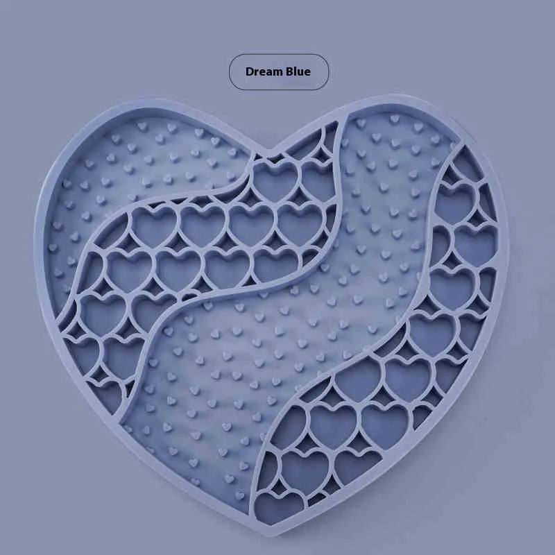 Bright bamboo green silicone dog licking mat on a light floor, textured surface with ridges, 20x18.5cm