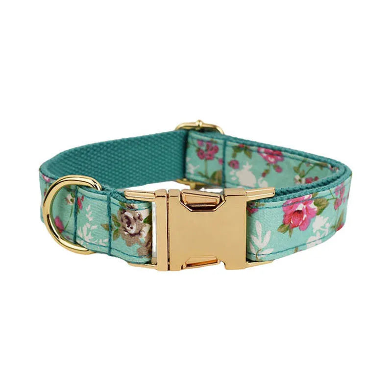 Rose print dog collar set with green background including collar, leash, detachable bow, and vest