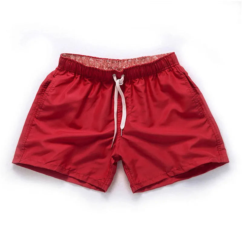 Men's plus size beach shorts in multiple colours including dark grey and navy blue with straight leg design for swimming and surfing