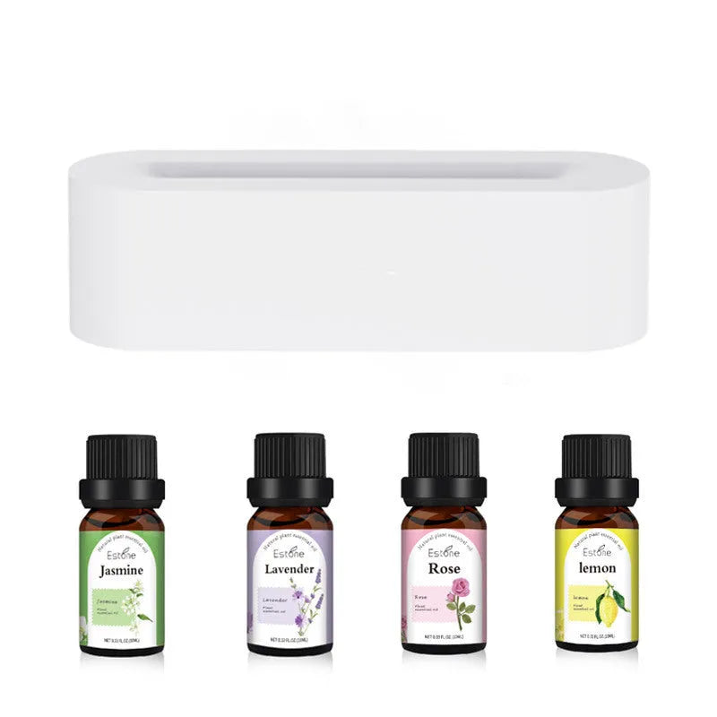 White square ultrasonic flame aroma diffuser and humidifier with LED light on a table.