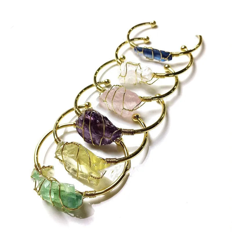 Handmade natural crystal rough stone bracelet with gold wire winding in geometric bohemian style