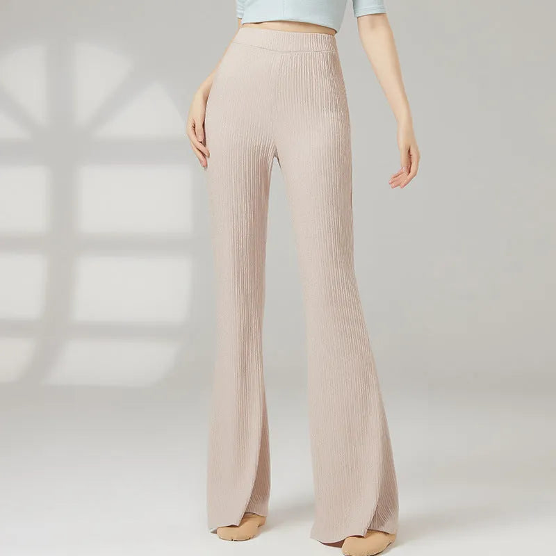 Women's solid colour polyester dance practice pants for classical ballet and body training.