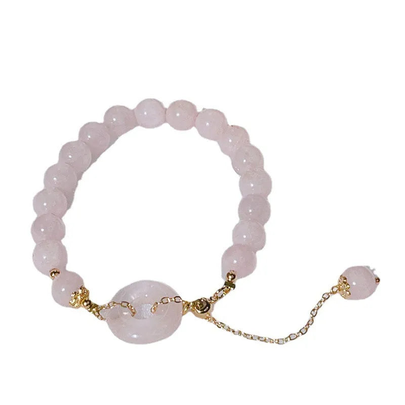 Pink crystal peace buckle bracelet with safety closure for women, adjustable design