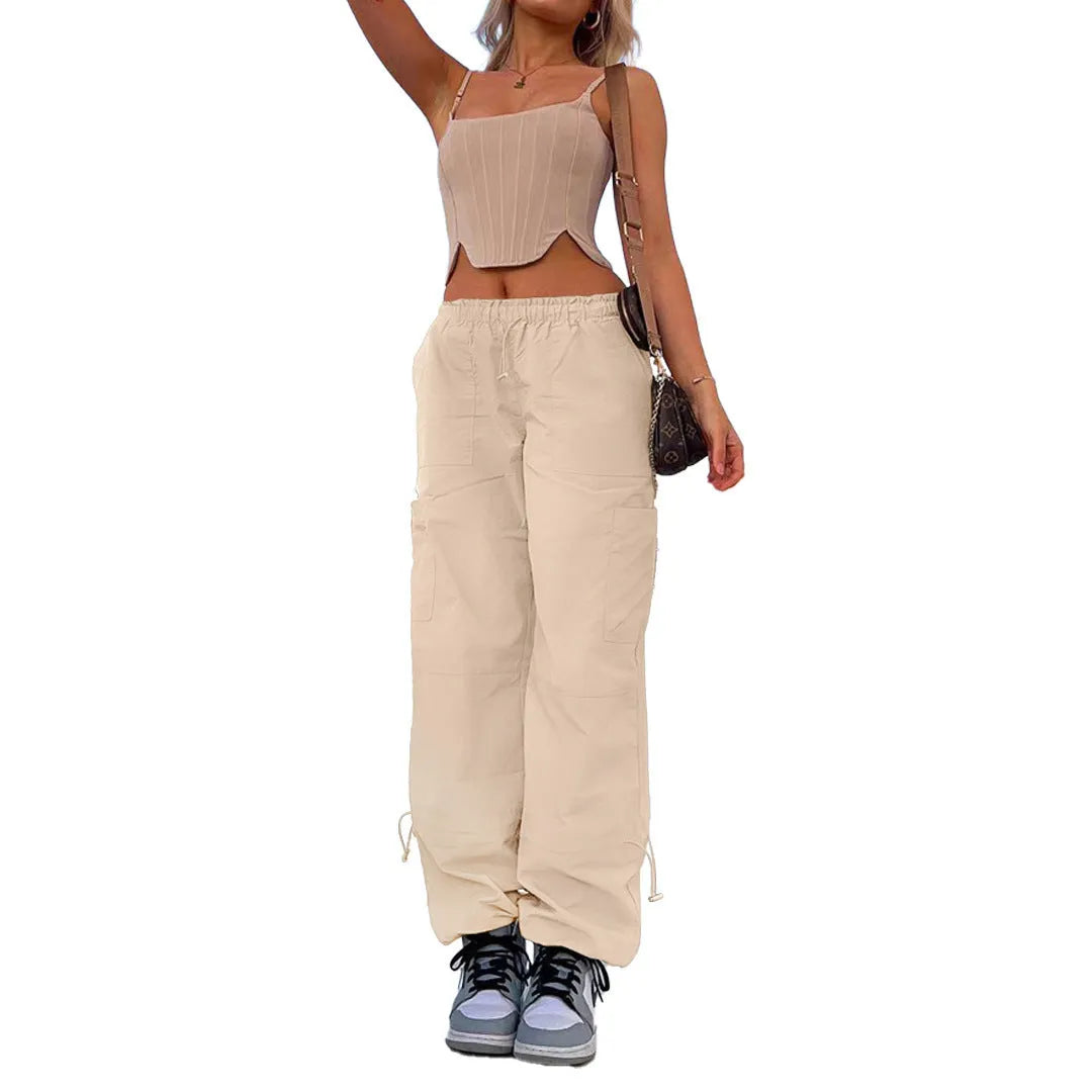 Multi-pocket straight-leg cargo casual pants in a light blue colour on a neutral background.
