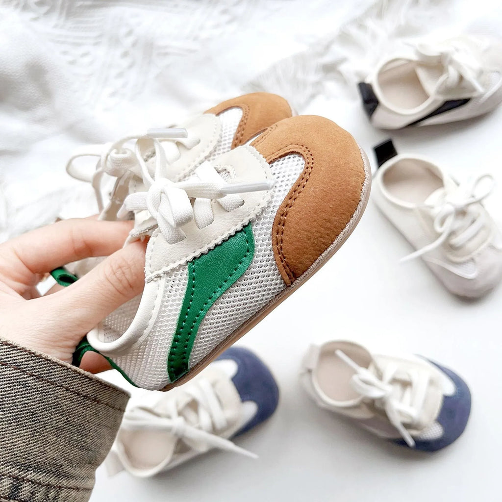 Baby shoes with hollow mesh upper and rubber sole in black, blue, brown, green for toddlers 1-3 years